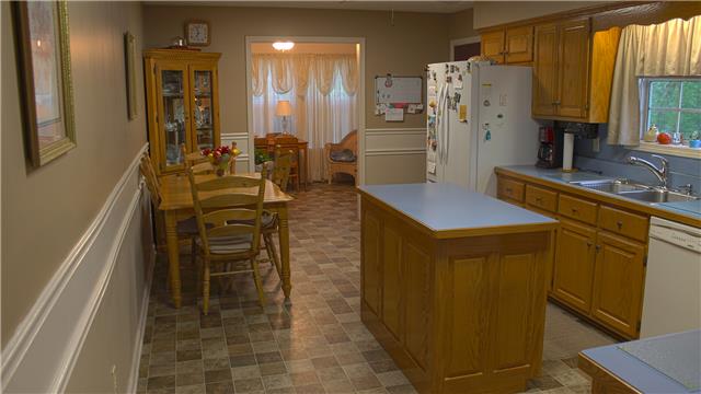 255 Biggs Road Cottontown, TN 37048 - Photo 6 of 18 As you enter the kitchen you will be amazed by all the kitchen counter and cabinet space. All the cabinets were custom made and are constructed with solid oak as are the bathroom cabinets!