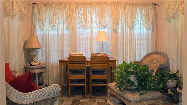 255 Biggs Road Cottontown, TN 37048 - Photo 8 of 18 This sun room is currently serving as a sitting room but would easily accommodate a dining table.
