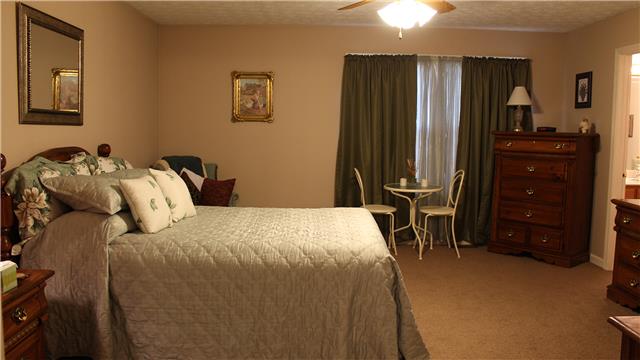 255 Biggs Road Cottontown, TN 37048 - Photo 9 of 18 The master suite is on the main level. It has ample space for most any bedroom furniture, a walk in closet and a full bath.
