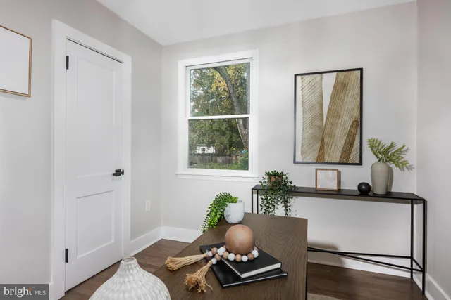 a living room with furniture and window