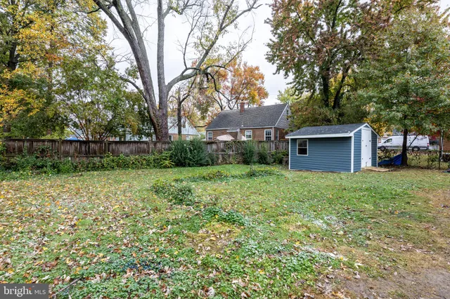 a house view with a backyard space