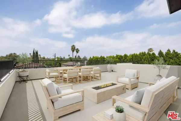 a view of a terrace with couches