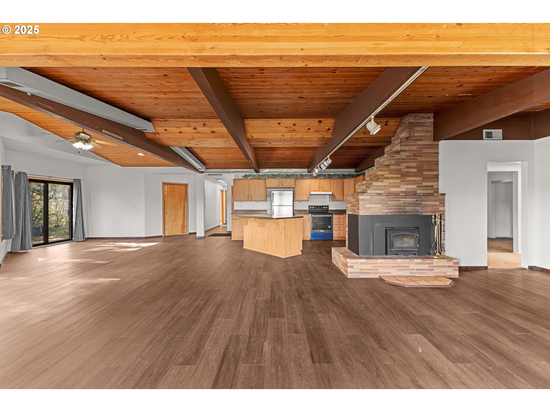 53874 Fishtrap Road Myrtle Point, OR 97458 - Photo 17 of 48 a view of a room with wooden floor