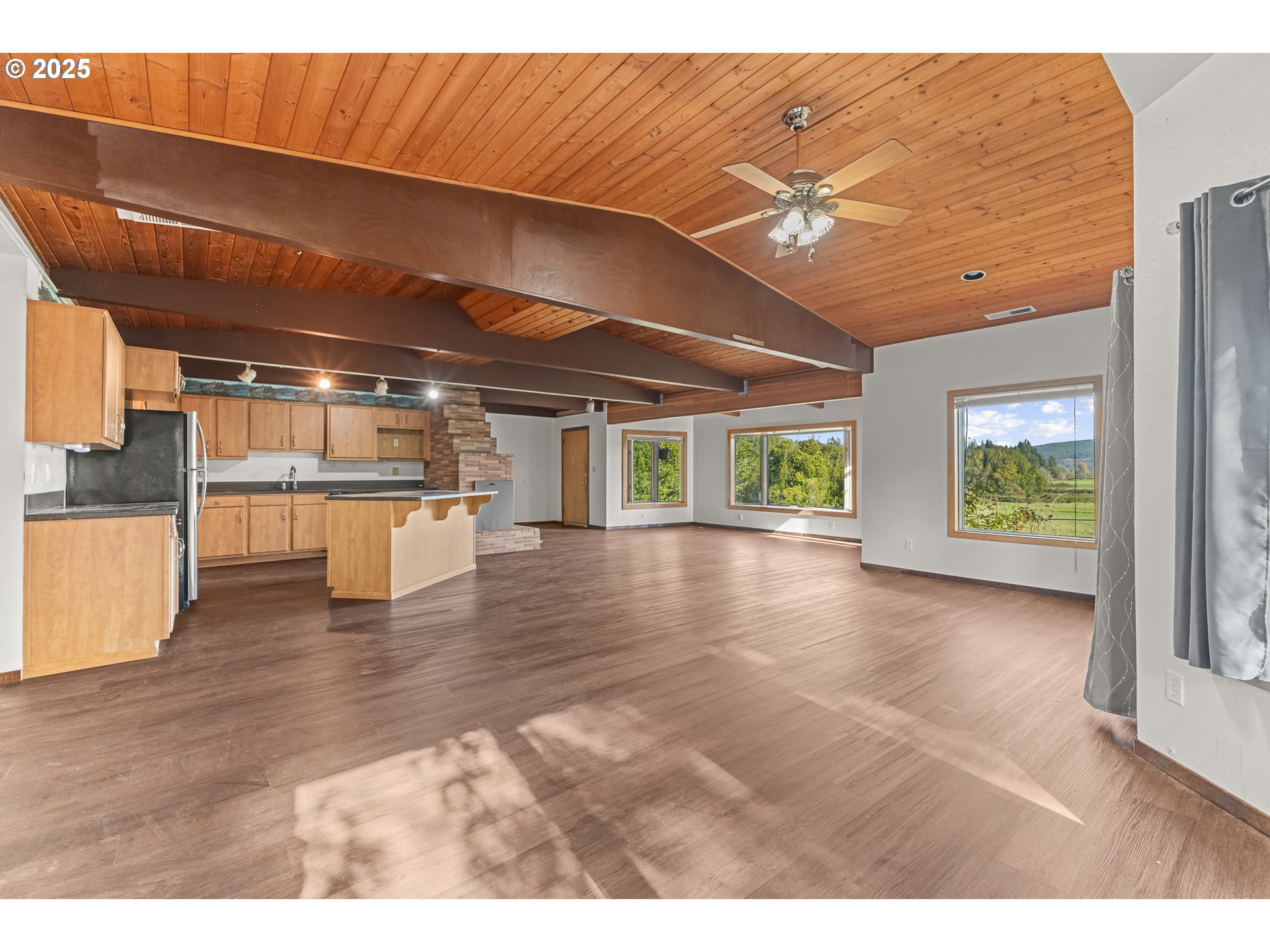 53874 Fishtrap Road Myrtle Point, OR 97458 - Photo 18 of 48 a view of a living room with a kitchen