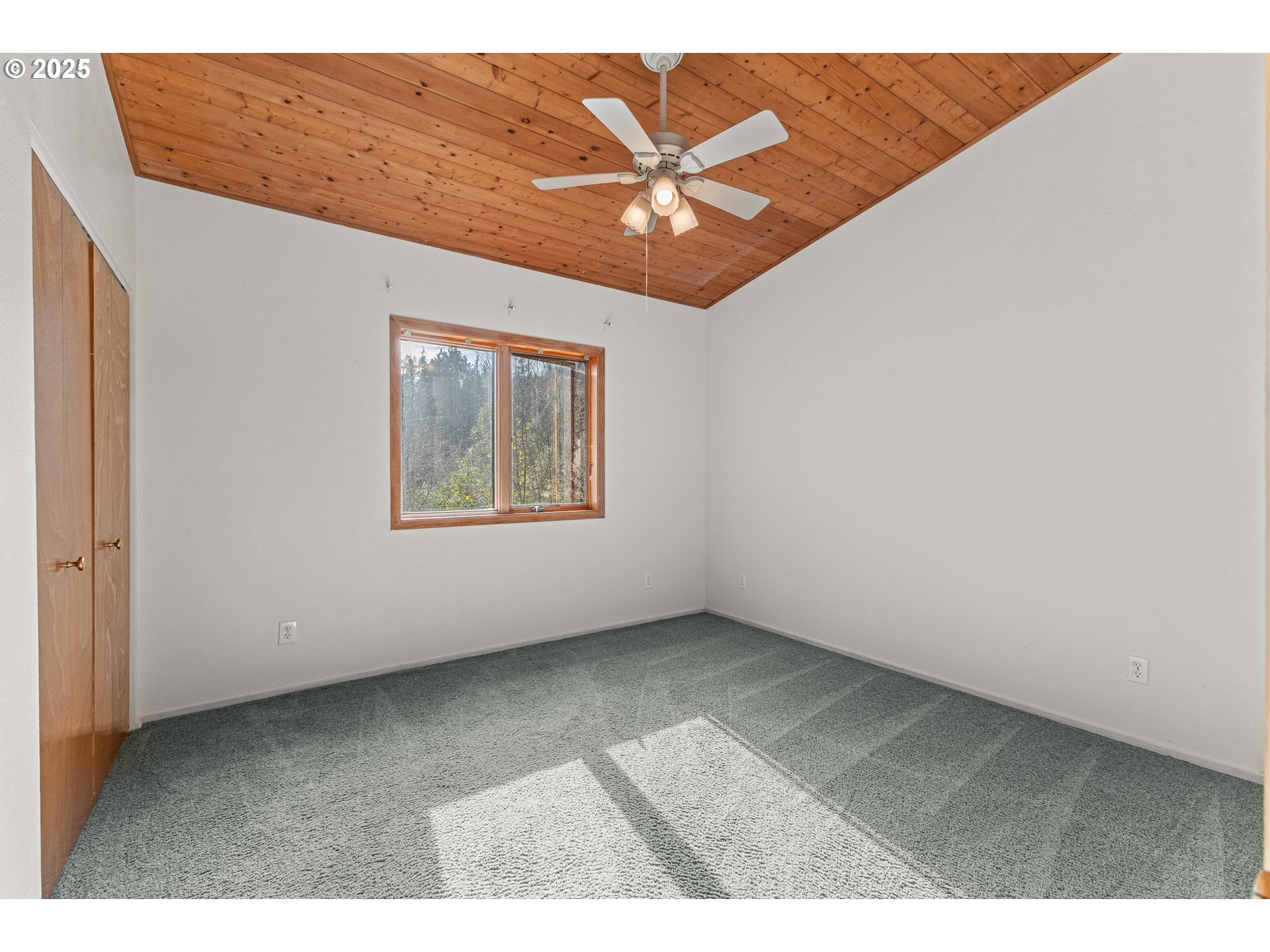 53874 Fishtrap Road Myrtle Point, OR 97458 - Photo 30 of 48 a view of an empty room with a window