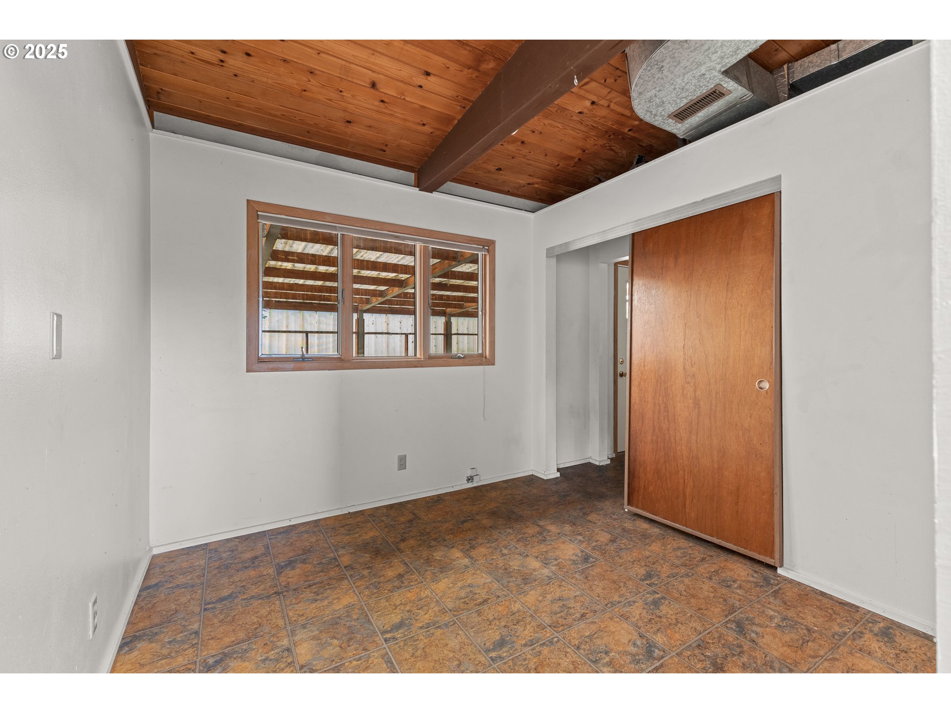 53874 Fishtrap Road Myrtle Point, OR 97458 - Photo 33 of 48 a view of an empty room with a window