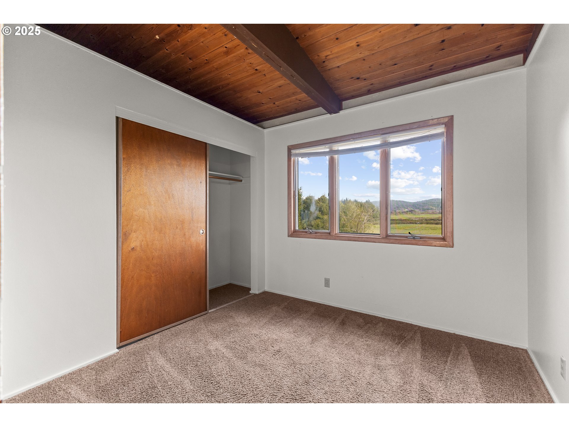 53874 Fishtrap Road Myrtle Point, OR 97458 - Photo 34 of 48 a view of an empty room with a window