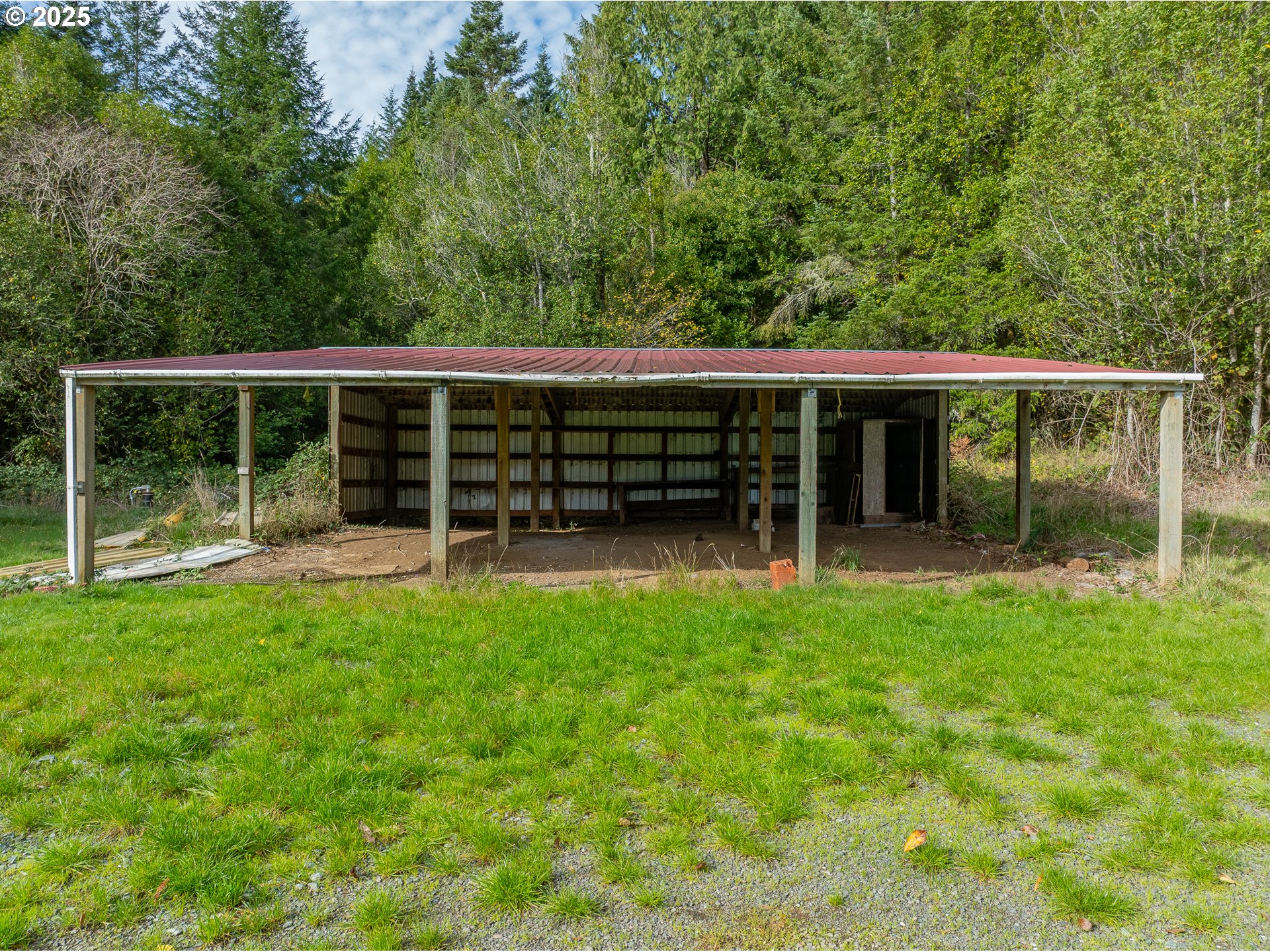 53874 Fishtrap Road Myrtle Point, OR 97458 - Photo 37 of 48 a view of a house with a backyard