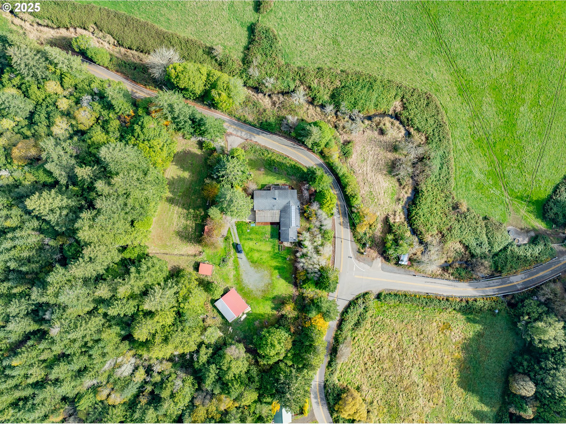 53874 Fishtrap Road Myrtle Point, OR 97458 - Photo 39 of 48 an aerial view of residential houses with outdoor space and trees all around