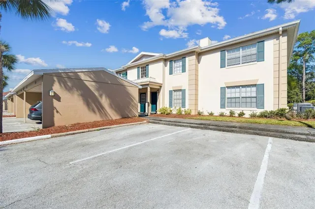 a view of a house with a street