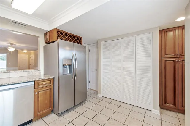 a spacious bathroom with a mirror a shower and a sink