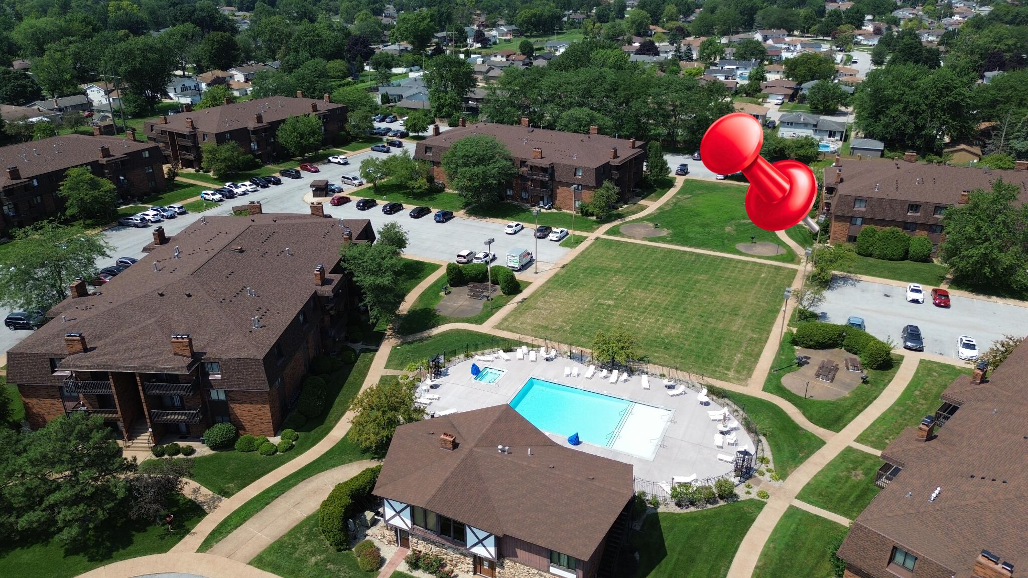 2049 45th Street, Unit 101 Highland, IN 46322 - Photo 11 of 13 an aerial view of a house swimming pool outdoor seating and yard