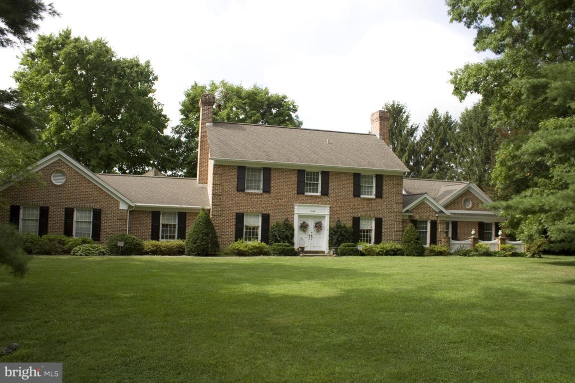 1340 Hunsicker Road Lancaster, PA 17601 - Photo 1 of 14 a front view of a house with a garden