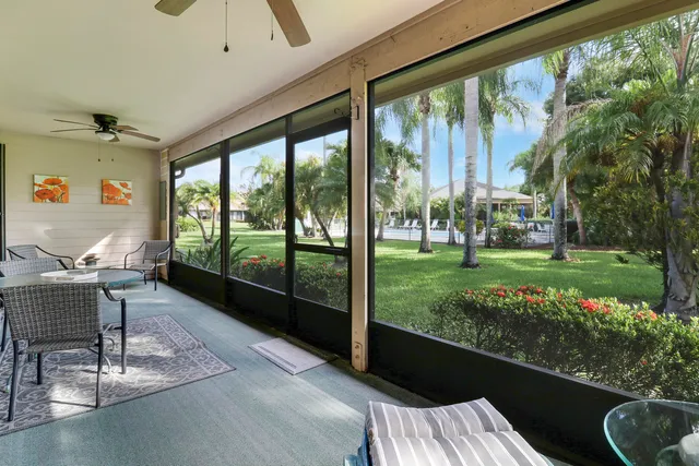 a living room filled with garden and furniture