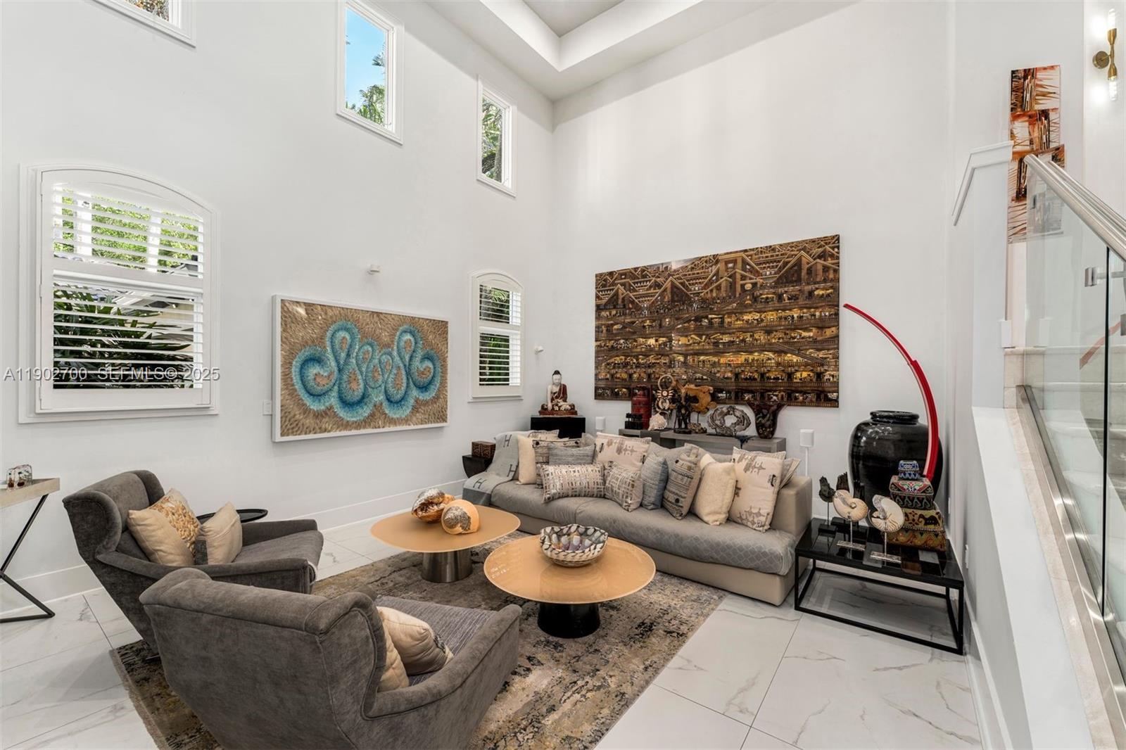 5770 Southwest 100th Street Pinecrest, FL 33156 - Photo 20 of 57 a living room with furniture and a couch