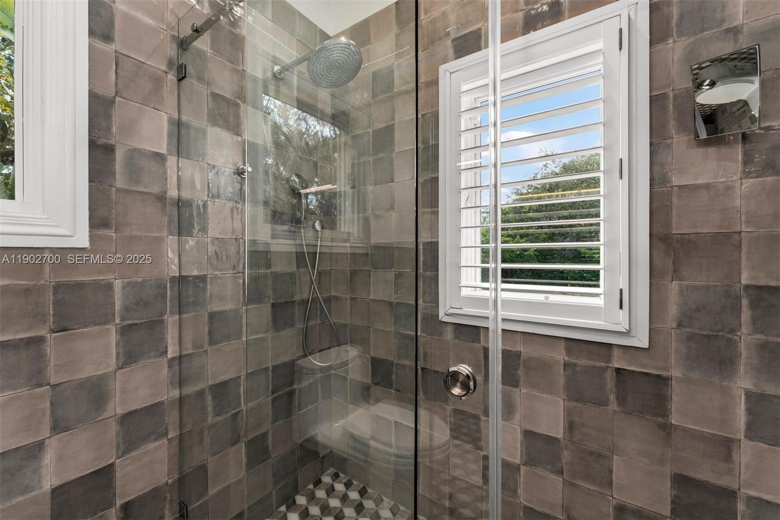 5770 Southwest 100th Street Pinecrest, FL 33156 - Photo 34 of 57 a bathroom with a shower