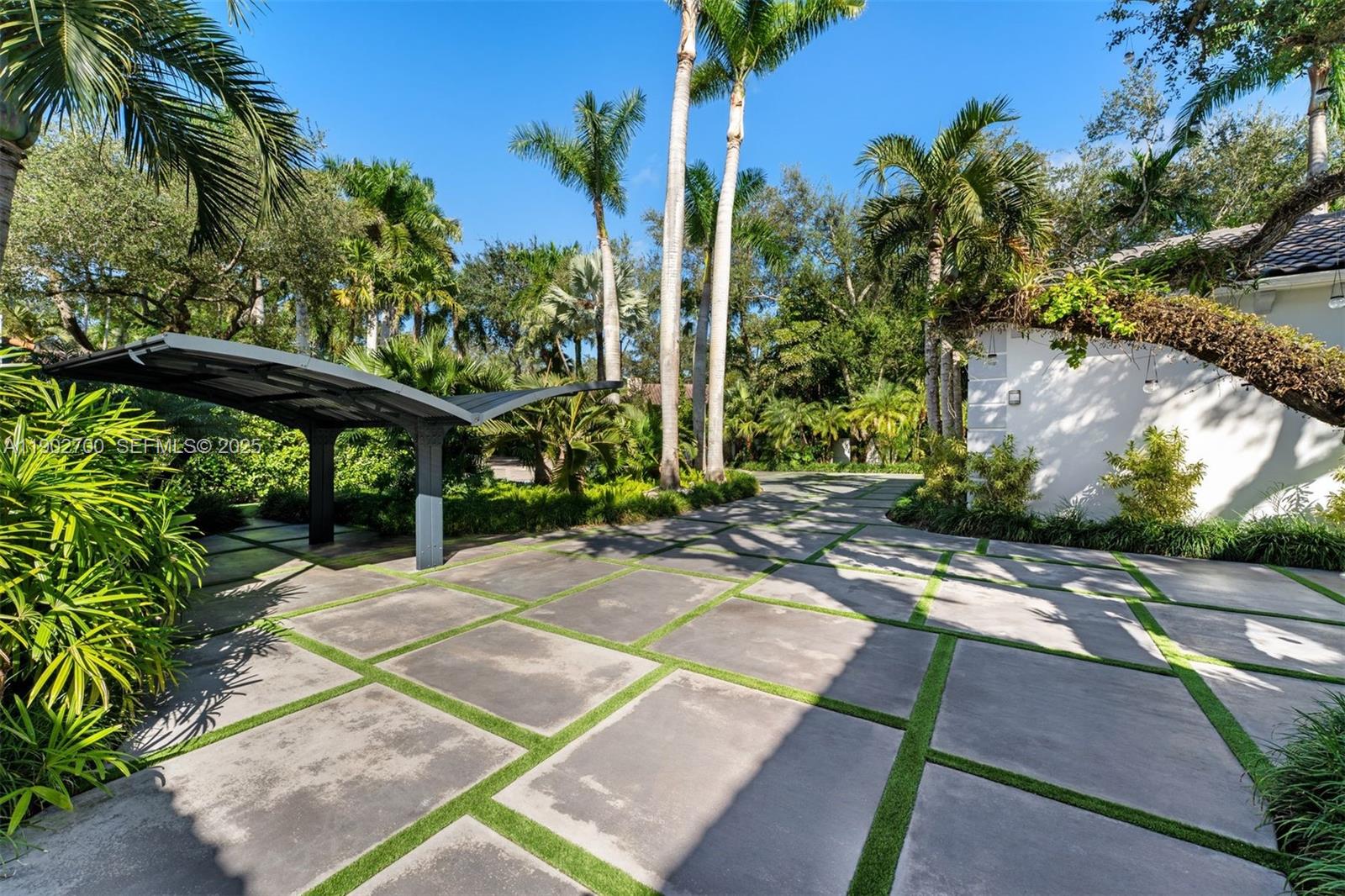 5770 Southwest 100th Street Pinecrest, FL 33156 - Photo 4 of 57 a view of a backyard