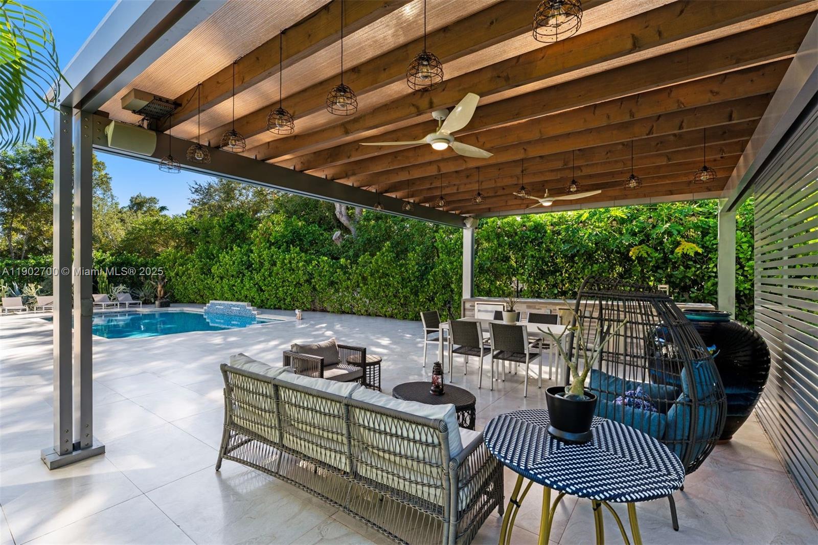 5770 Southwest 100th Street Pinecrest, FL 33156 - Photo 49 of 57 a view of yard with patio