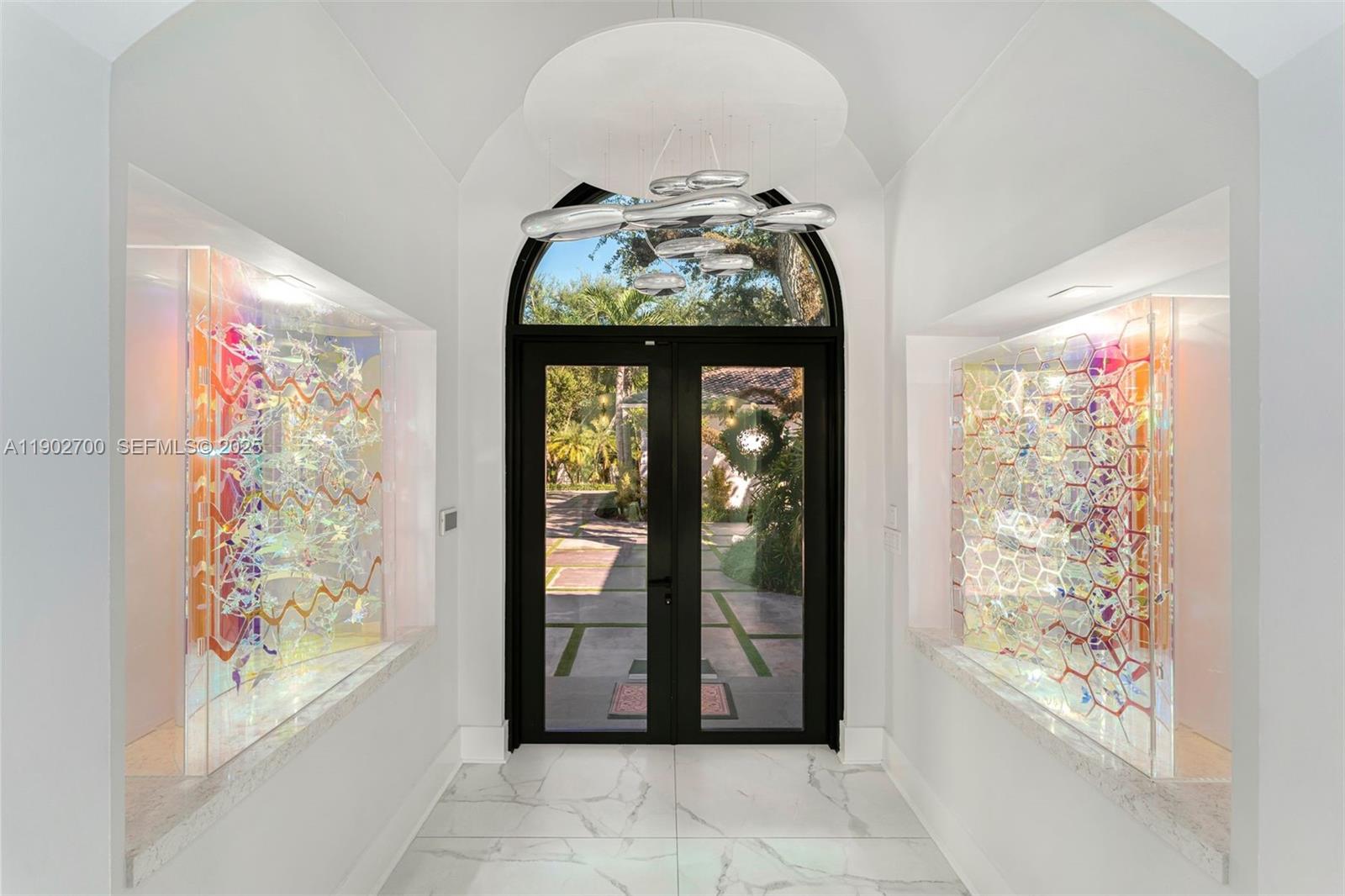 5770 Southwest 100th Street Pinecrest, FL 33156 - Photo 8 of 57 a view of entryway with interior