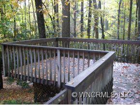 345 Reuben Branch Road Maggie Valley, NC 28751 - Photo 5 of 12 a view of balcony with wooden floor
