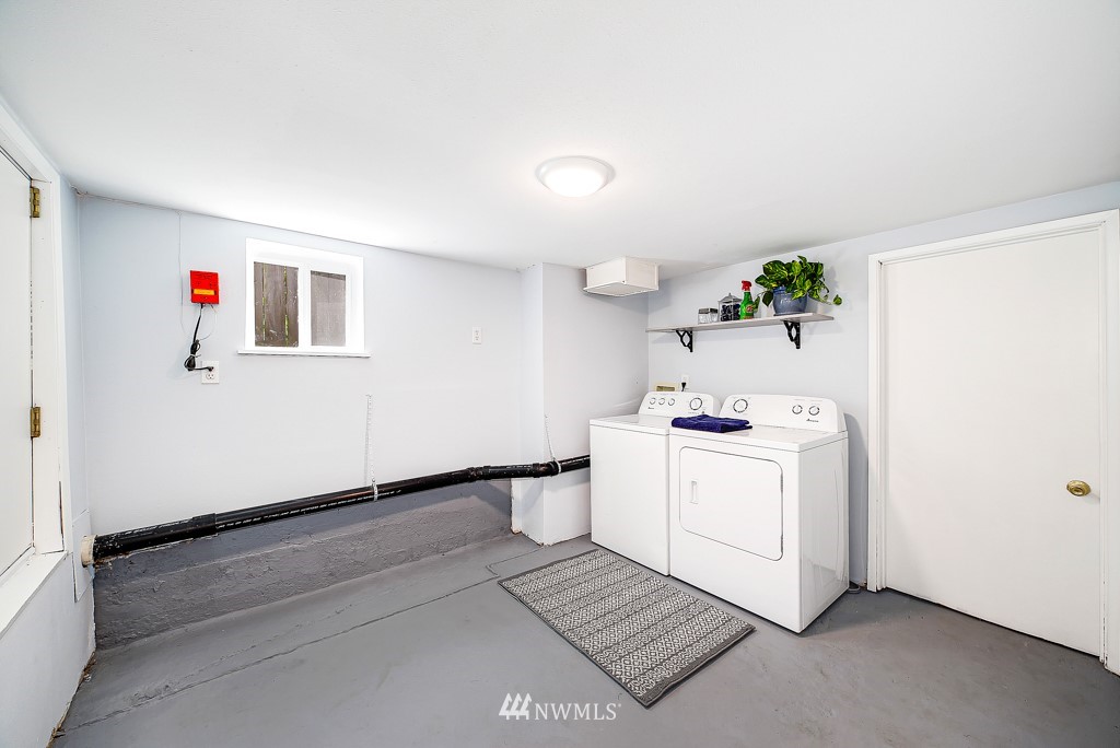 19637 Southeast 149th Street Renton, WA 98059 - Photo 14 of 29 a utility room with dryer and washer