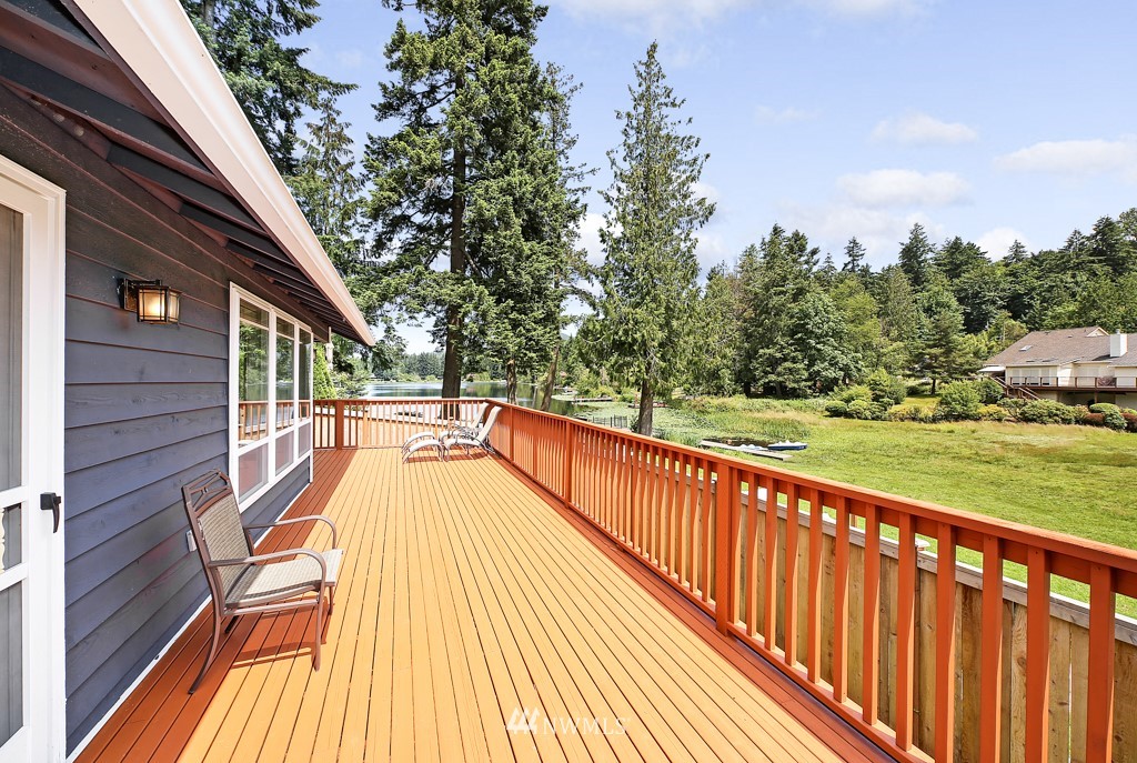 19637 Southeast 149th Street Renton, WA 98059 - Photo 16 of 29 a view of balcony with wooden floor and fence