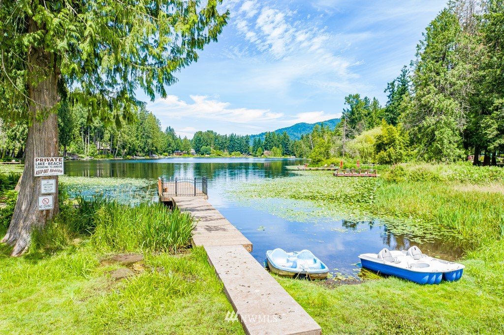 19637 Southeast 149th Street Renton, WA 98059 - Photo 20 of 29 a view of a lake with a big yard