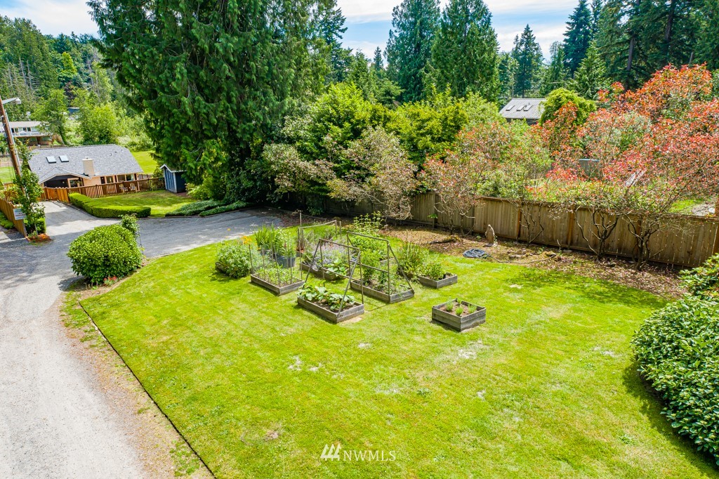 19637 Southeast 149th Street Renton, WA 98059 - Photo 22 of 29 a view of a garden with an outdoor space