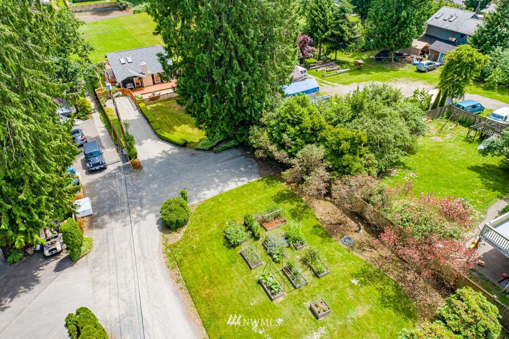 19637 Southeast 149th Street Renton, WA 98059 - Photo 25 of 29 an aerial view of a house with swimming pool and garden