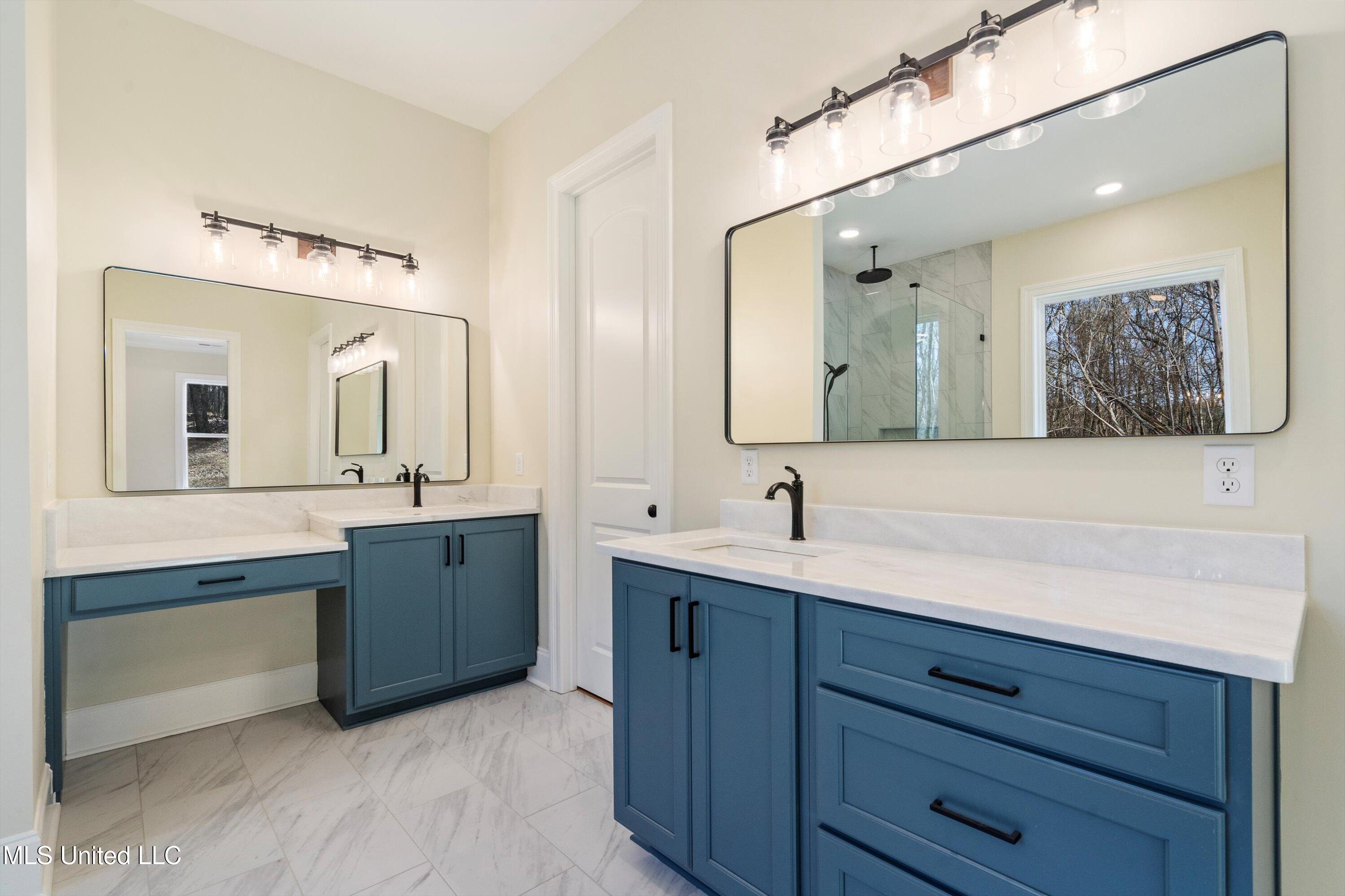 1571 Kimber Cove Hernando, MS 38632 - Photo 23 of 38 His/Hers Vanity with Sink