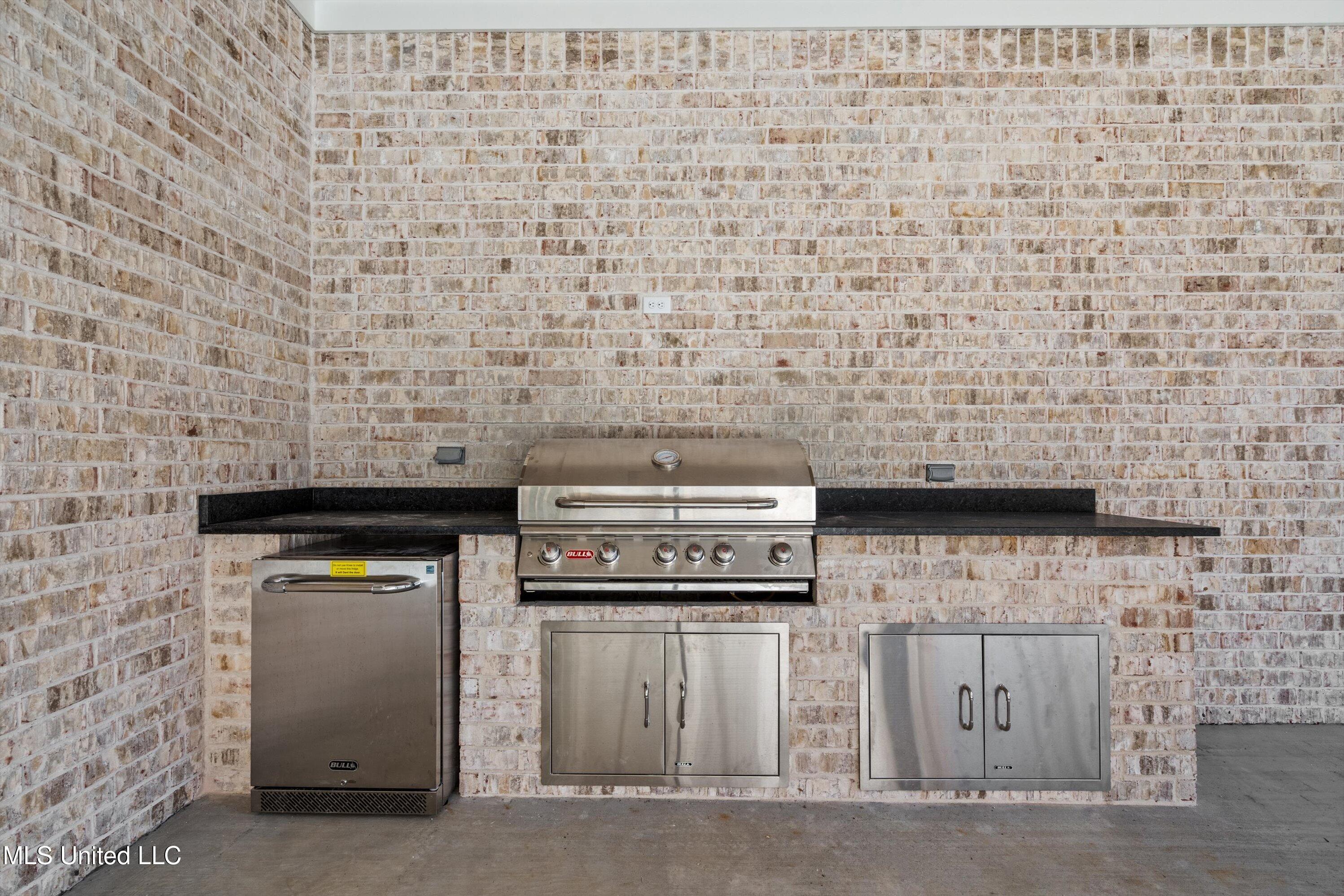 1571 Kimber Cove Hernando, MS 38632 - Photo 34 of 38 Outdoor Kitchen b