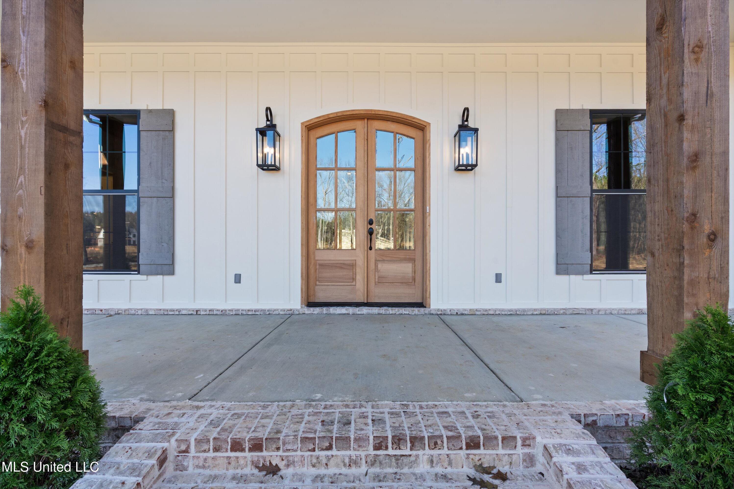 1571 Kimber Cove Hernando, MS 38632 - Photo 4 of 38 Double Door Covered Entry