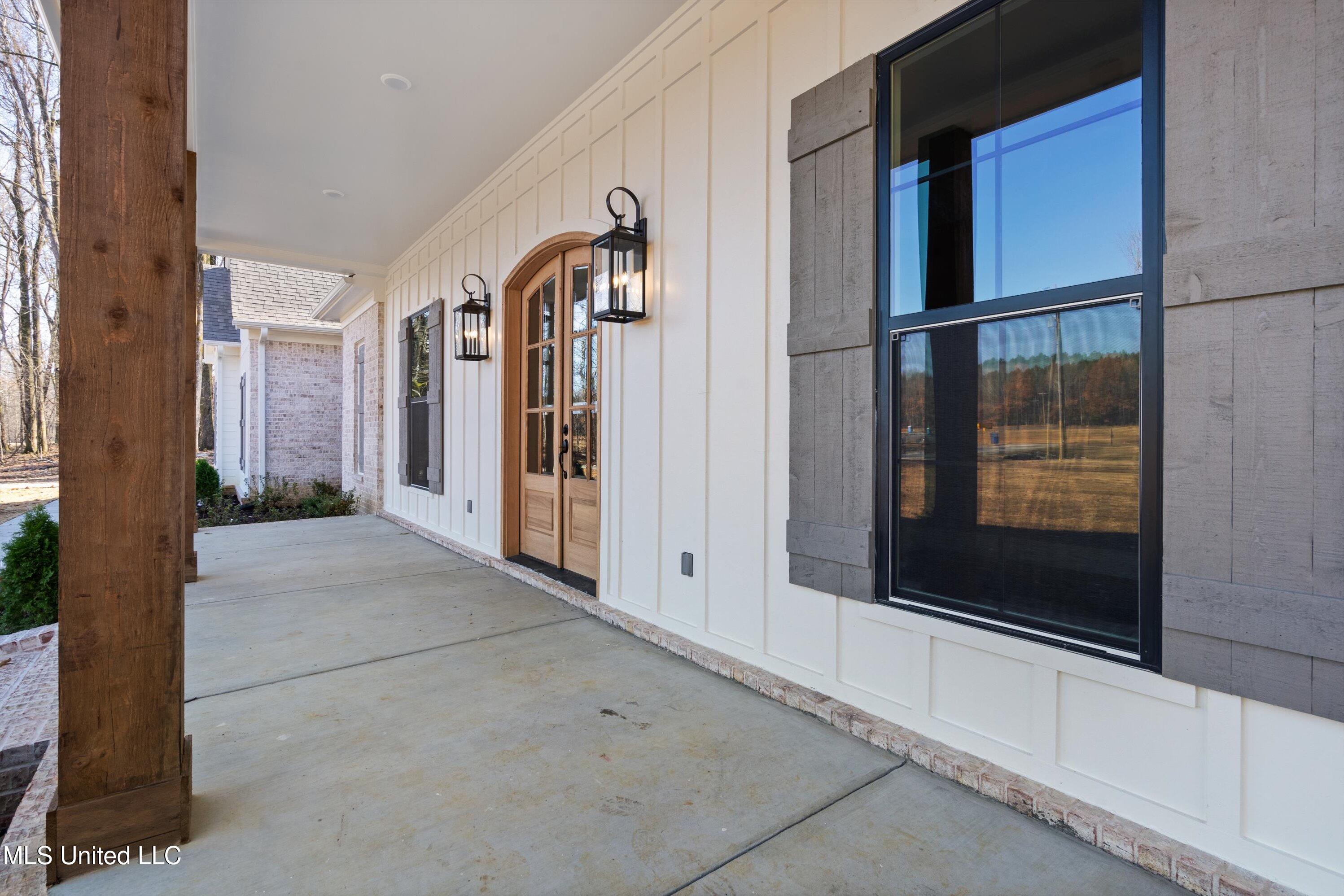 1571 Kimber Cove Hernando, MS 38632 - Photo 5 of 38 Covered Front Porch