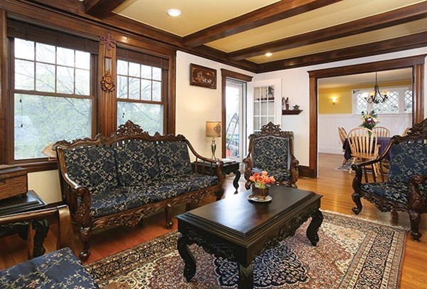 145 University Road, Unit 2 Brookline, MA 02445 - Photo 2 of 7 a living room with furniture and a window