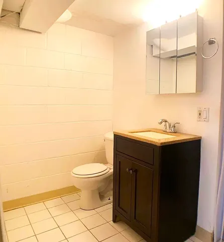 a bathroom with a sink and a toilet