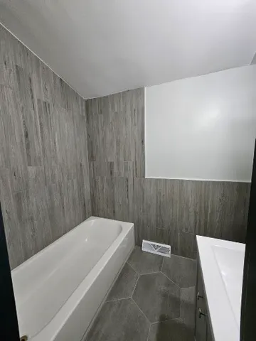 a bathroom with a bathtub
