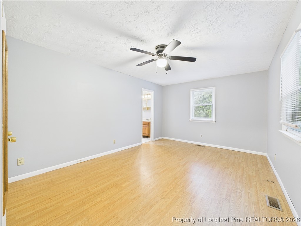 1540 Mack Street Spring Lake, NC 28390 - Photo 12 of 31 a view of an empty room with a window