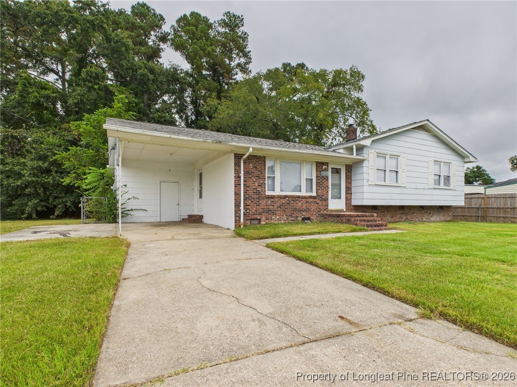 1540 Mack Street Spring Lake, NC 28390 - Photo 2 of 31 a front view of house with yard and green space