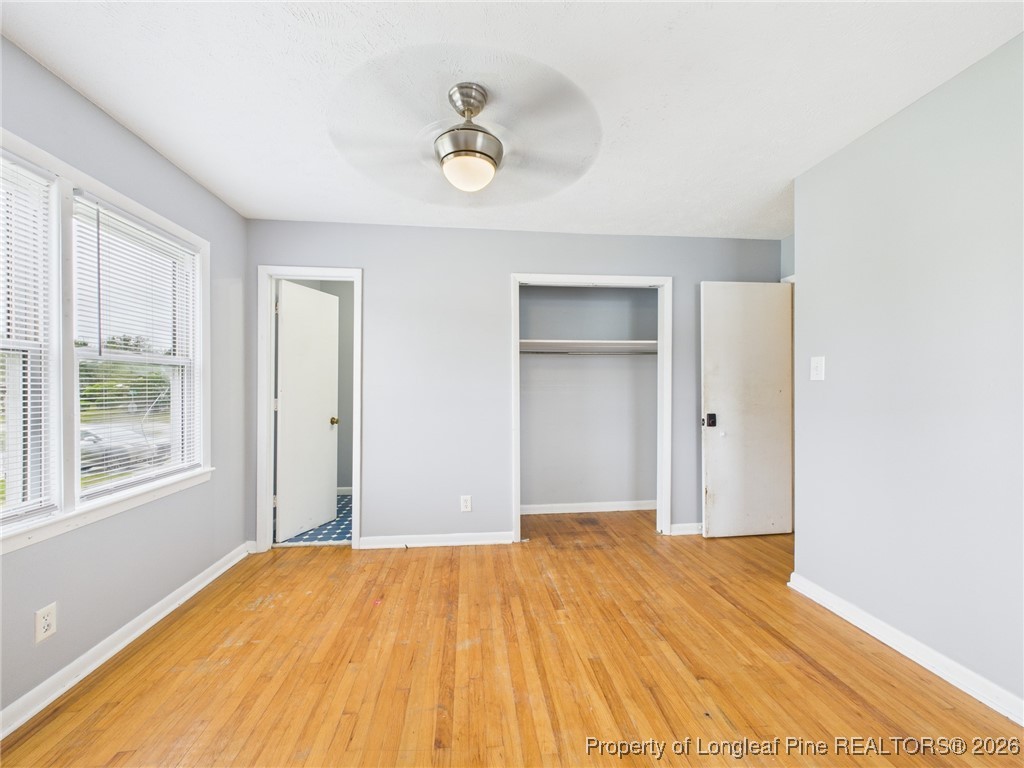 1540 Mack Street Spring Lake, NC 28390 - Photo 29 of 31 a bedroom with a bed and a window