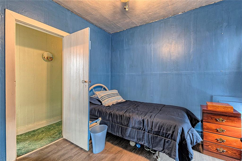 11189 Old Trail Road Irwin, PA 15642 - Photo 12 of 22 a bedroom with a bed and a window