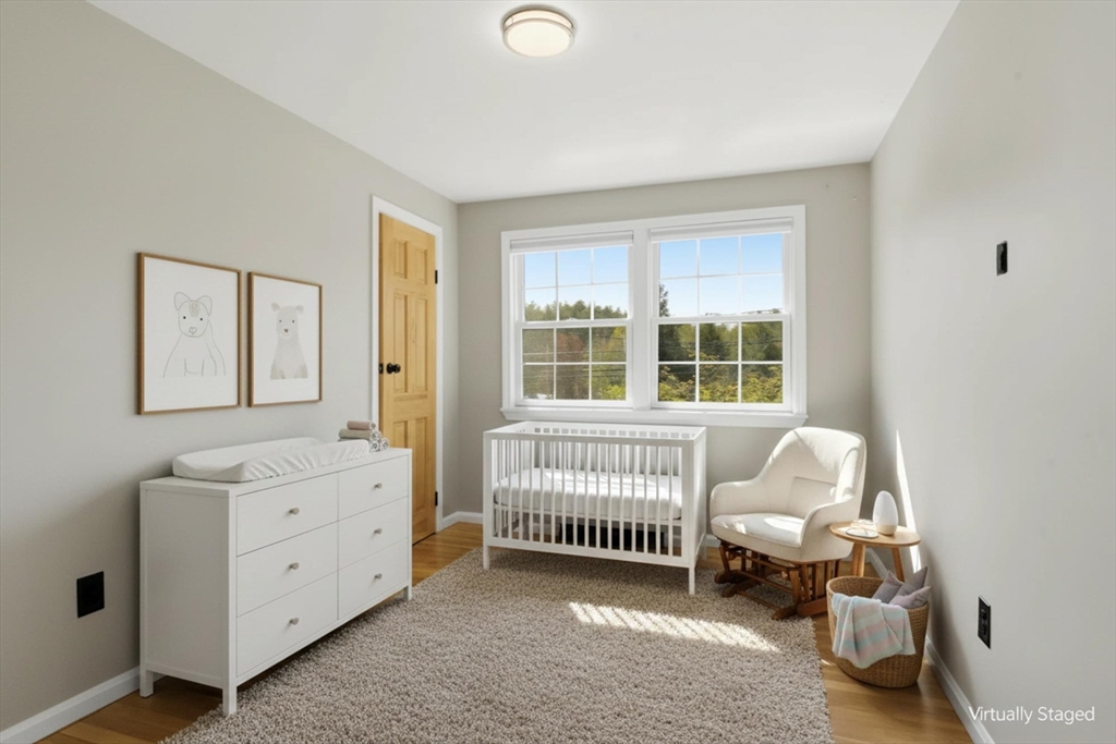 196 Center Street Groveland, MA 01834 - Photo 22 of 32 a living room with furniture and a window