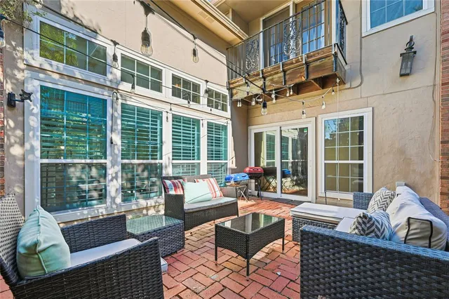 a building outdoor space with patio furniture