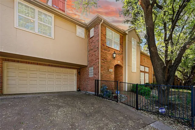 a view of a house with a street