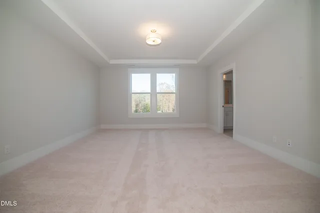 a view of a room that has a window in it