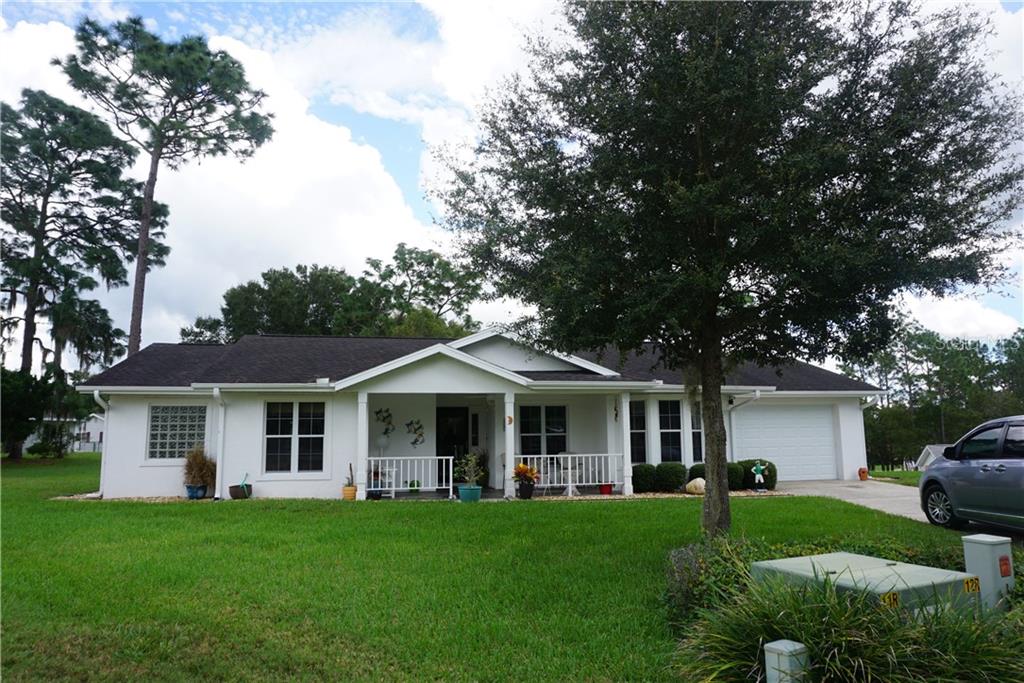 8549 Southwest 108th Pl Road Ocala, FL 34481 - Photo 1 of 1 Come sit on your front porch of this beautiful home!
