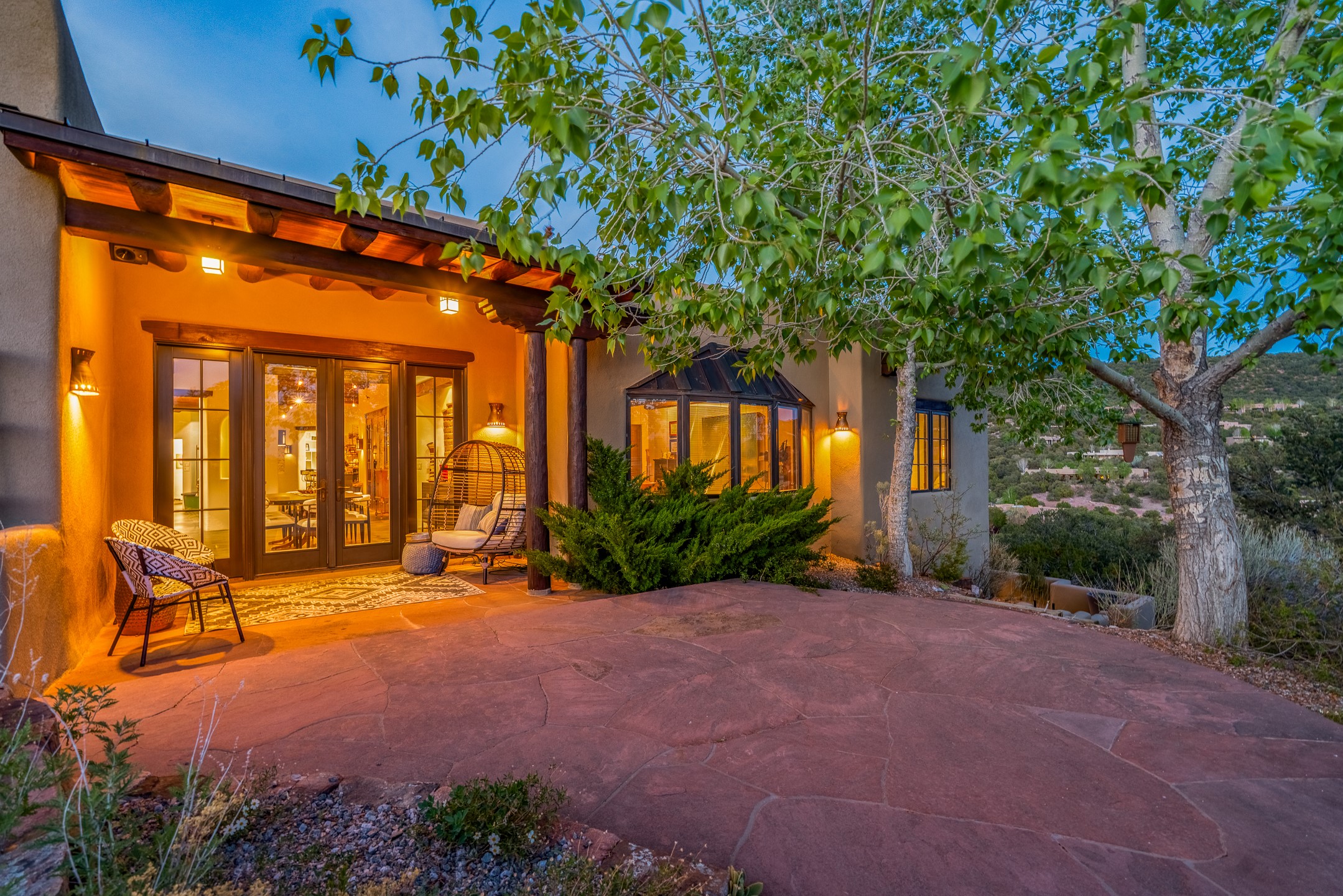 148 Barranca Road Santa Fe, NM 87501 - Photo 16 of 86 Outdoor seating area adjacent to the dining and living room