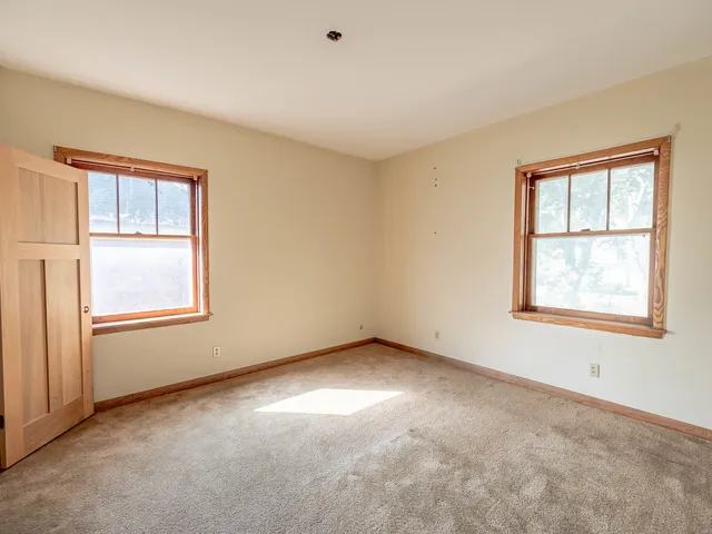a view of an empty room with window