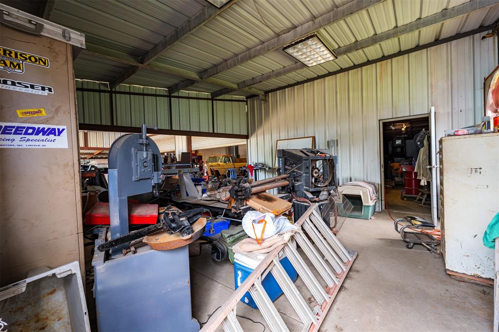 601 Houston School Road Red Oak, TX 75154 - Photo 19 of 32 Garage featuring a workshop area