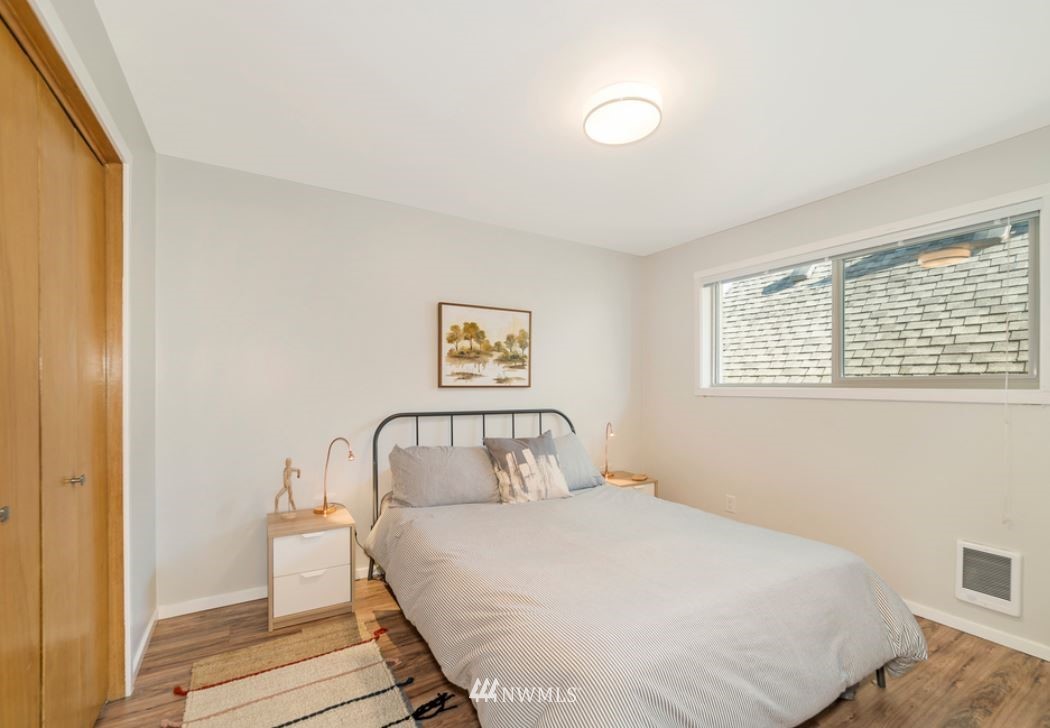 530 Bell Street Edmonds, WA 98020 - Photo 6 of 7 a bedroom with a bed and a window