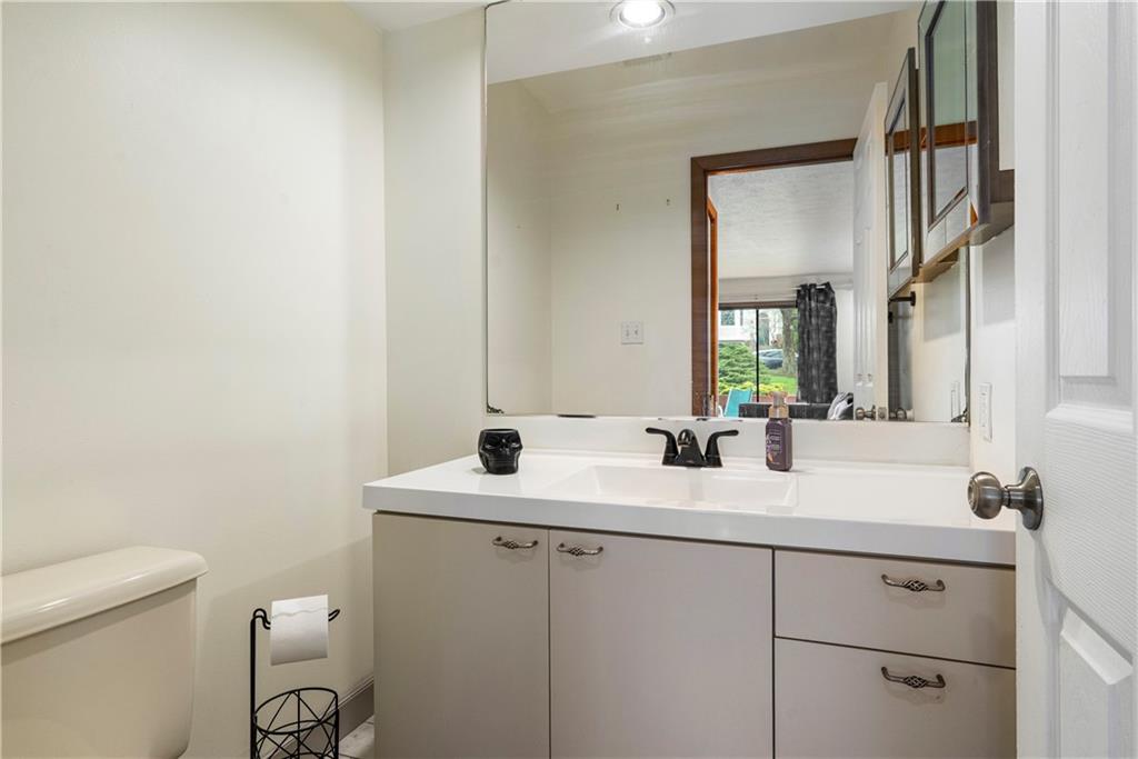 420 Spring Run Drive Monroeville, PA 15146 - Photo 6 of 24 a bathroom with a sink and a mirror